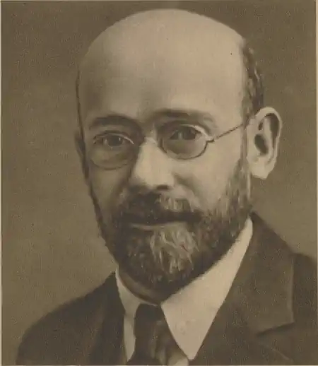 Retrato de Janusz Korczak, educador e autor de Quando eu voltar a ser criança, associado à escuta da infância e à autoridade adulta.